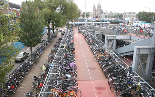 http://www.streetsblog.org/wp-content/uploads/2006/10/amsterdam_bikeparking.jpg